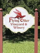 Flying otter sign